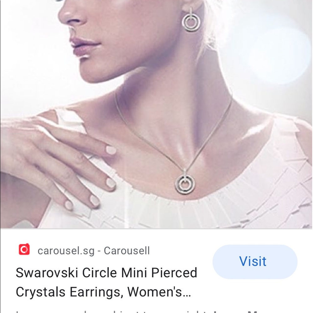 Mini circle crystal earrings from Swarovski.